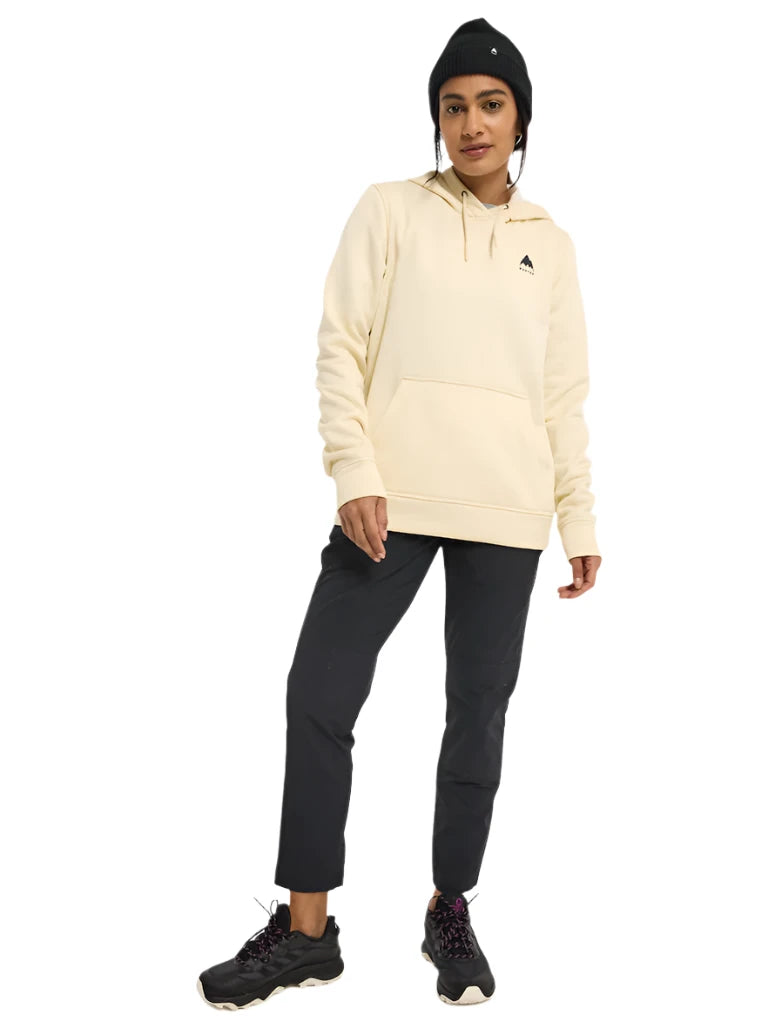 Burton Women's Oak Pullover Hoodie 2025 - A cream-colored hoodie with a black logo on the left chest and a kangaroo pocket at the front.