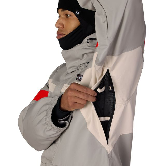 686 Logic jacket side profile, light gray shell with red stripe, front zipper pockets.