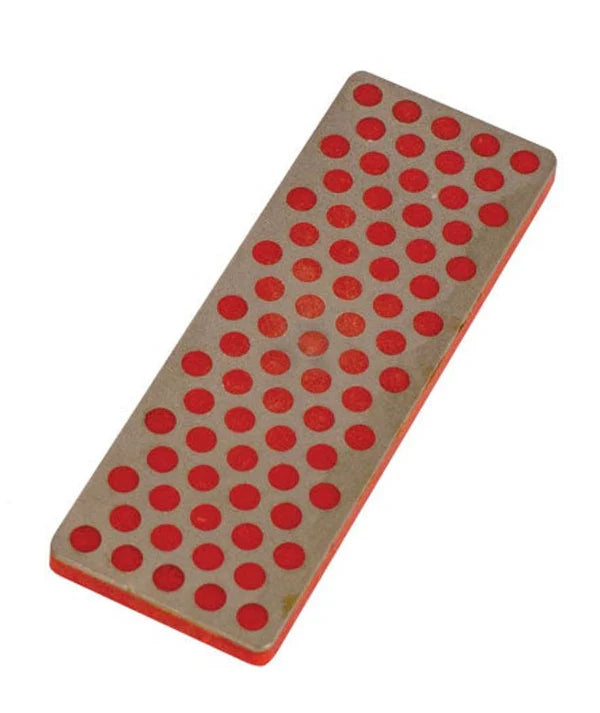 Oneball Diamond Stone Fine 2025 - A rectangular, gray stone with a flat top and rounded edges, featuring numerous small red dots arranged in rows across its surface.