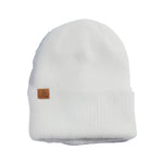 PEARL FUZZY KNIT BEANIE 2024 - A white beanie with a fuzzy texture and pearl-colored accents.