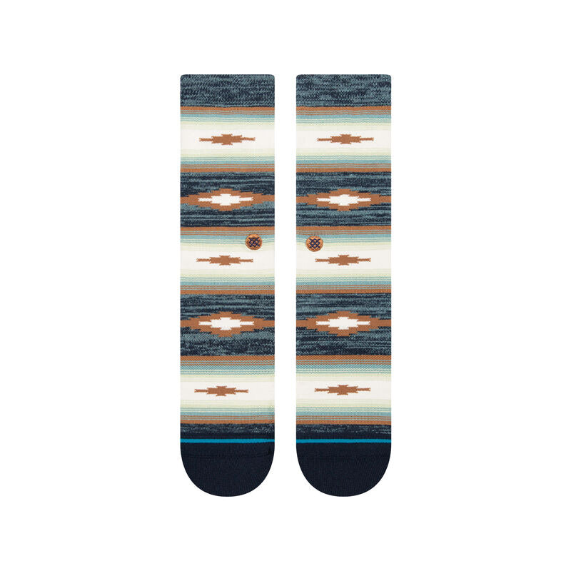 PALAMA CREW C SOCK 2023 - A pair of crew socks with a brown, white and blue patterned design.
