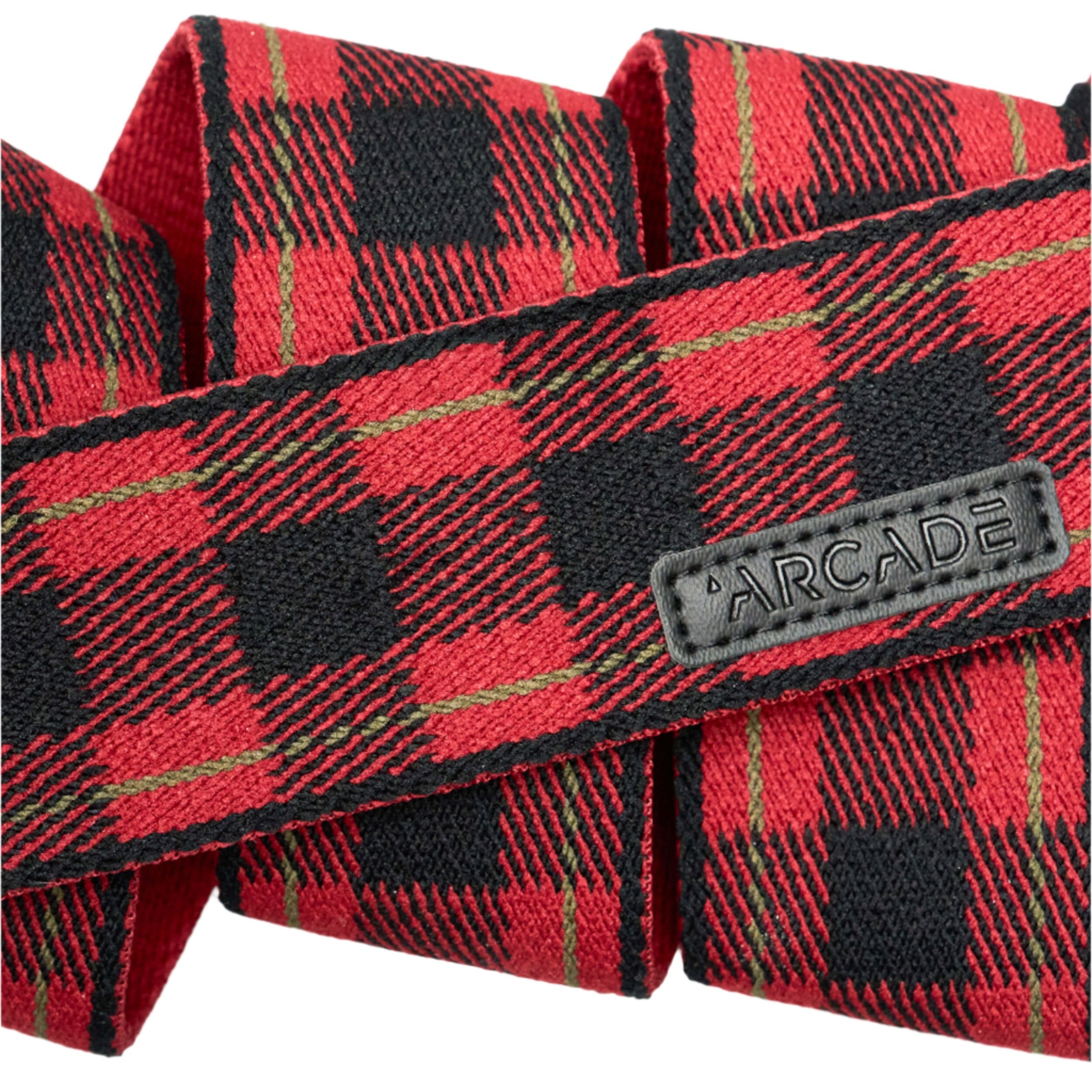 Arcade Plaid Stretch Belt 2025 - Red, black, and green plaid pattern on a red background.