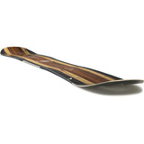 Head Daymaker Snowboard 2025 - A snowboard with a brown wood grain pattern on its top surface.