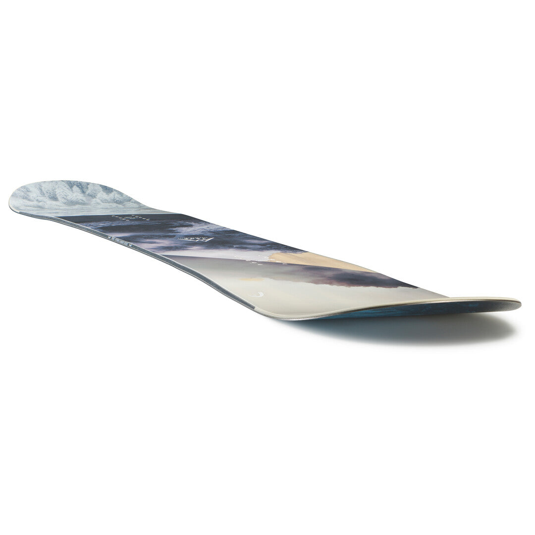 Head True 2.0 Ice Snowboard 2025 - A snowboard with a predominantly white base and blue accents, featuring a mountainous landscape design on its top surface.