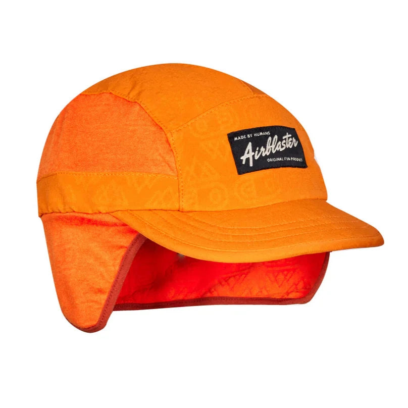 Airblaster Quick Strike Cap 2025 - A bright orange cap with a black patch on the front featuring white lettering that reads "Airblaster".