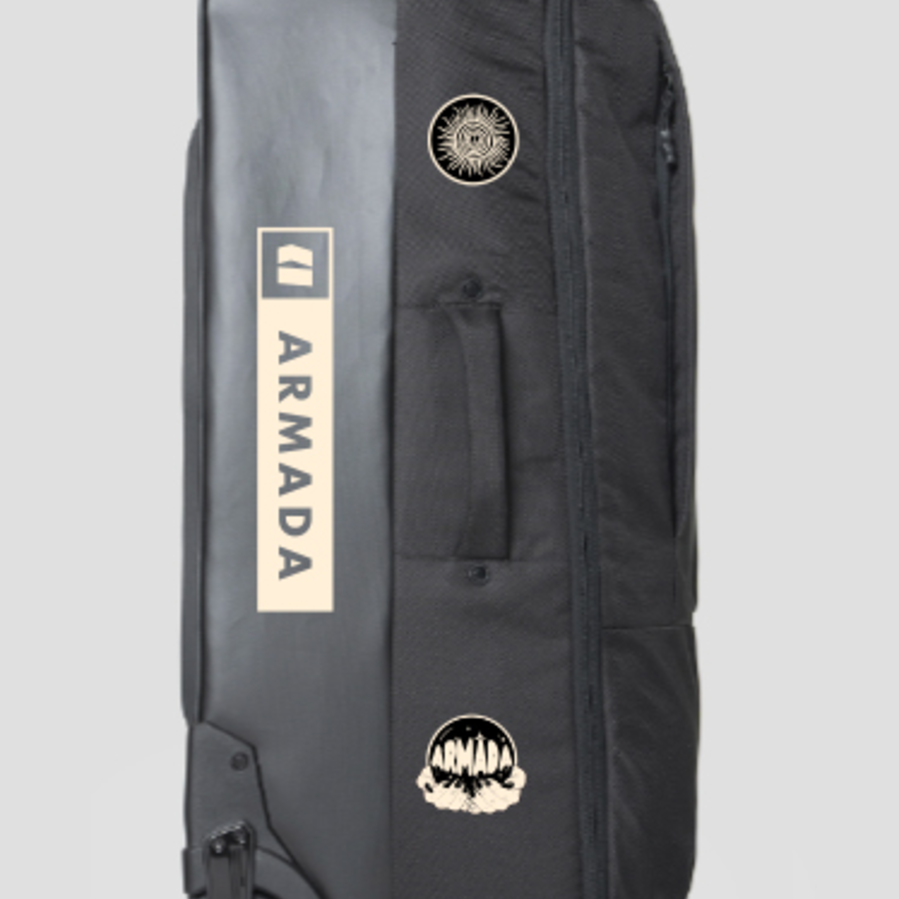 Armada Travel Roller 90L Bag 2025 - Black bag with white logo and sun graphic on top, standing upright with wheels visible at bottom left corner.
