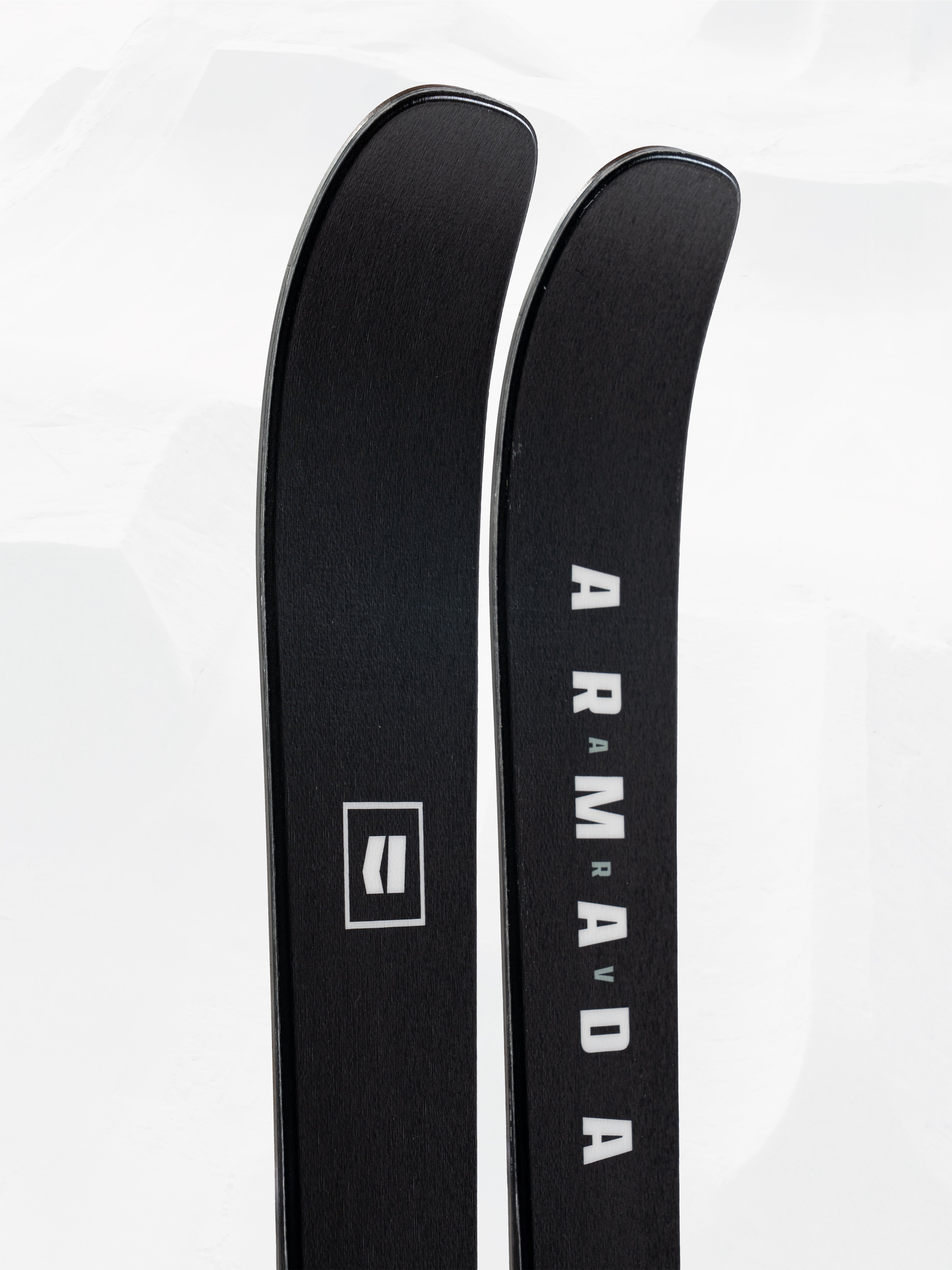 Black skis with Armada ARV 88 text and square logo on topsheets