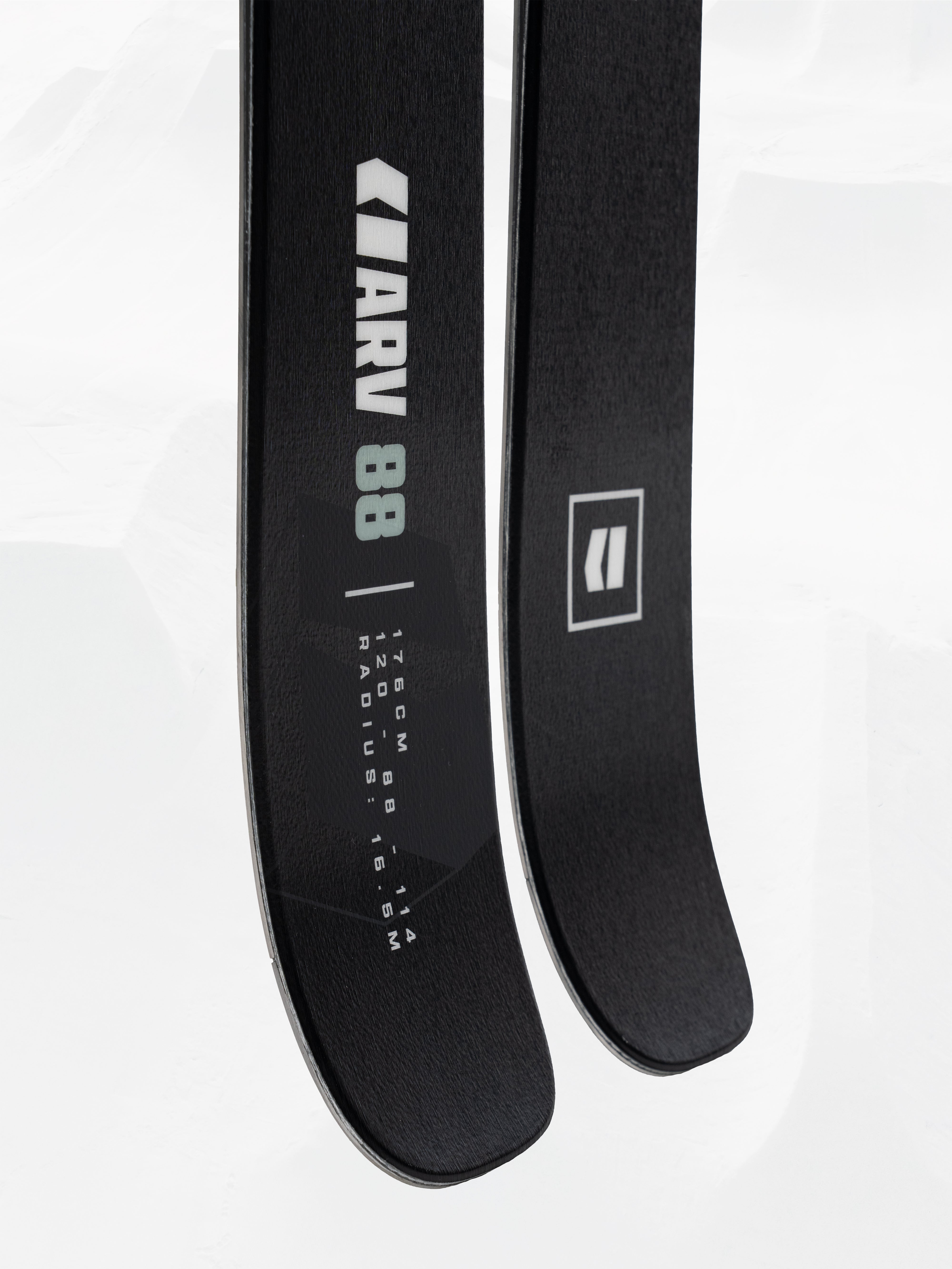 Black skis close-up with Armada ARV 88 branding and markings