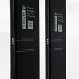 Black skis underside close-up with made in Bulgaria label and barcode