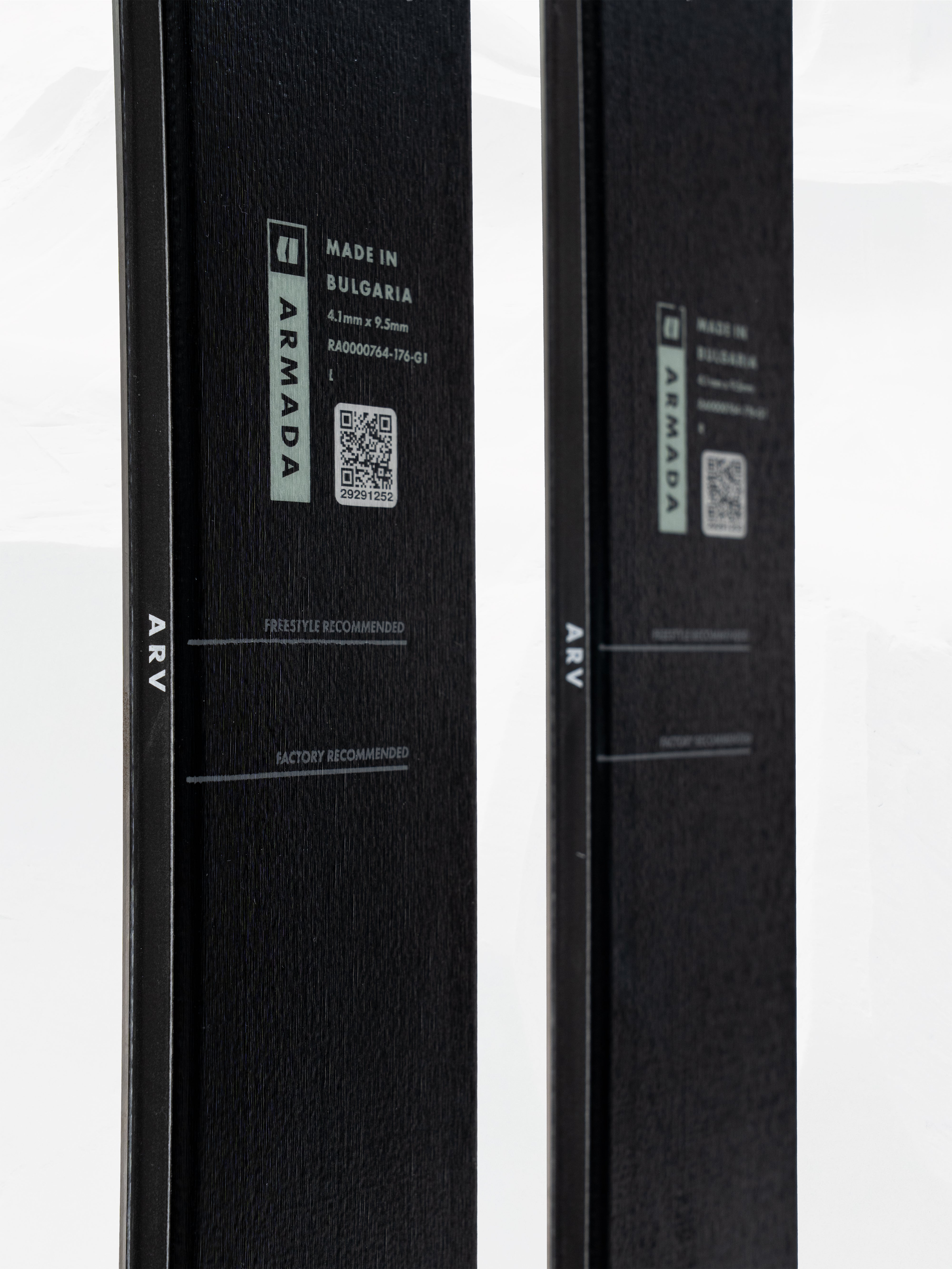 Black skis underside close-up with made in Bulgaria label and barcode