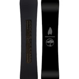 Arbor Candle Rain Snowboard 2025 - A black snowboard with a wood grain pattern on its top surface.