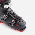 Rossignol EVO 70 HV+ Ski Boots 2025 - Black ski boots with silver buckles and red accents on the soles.