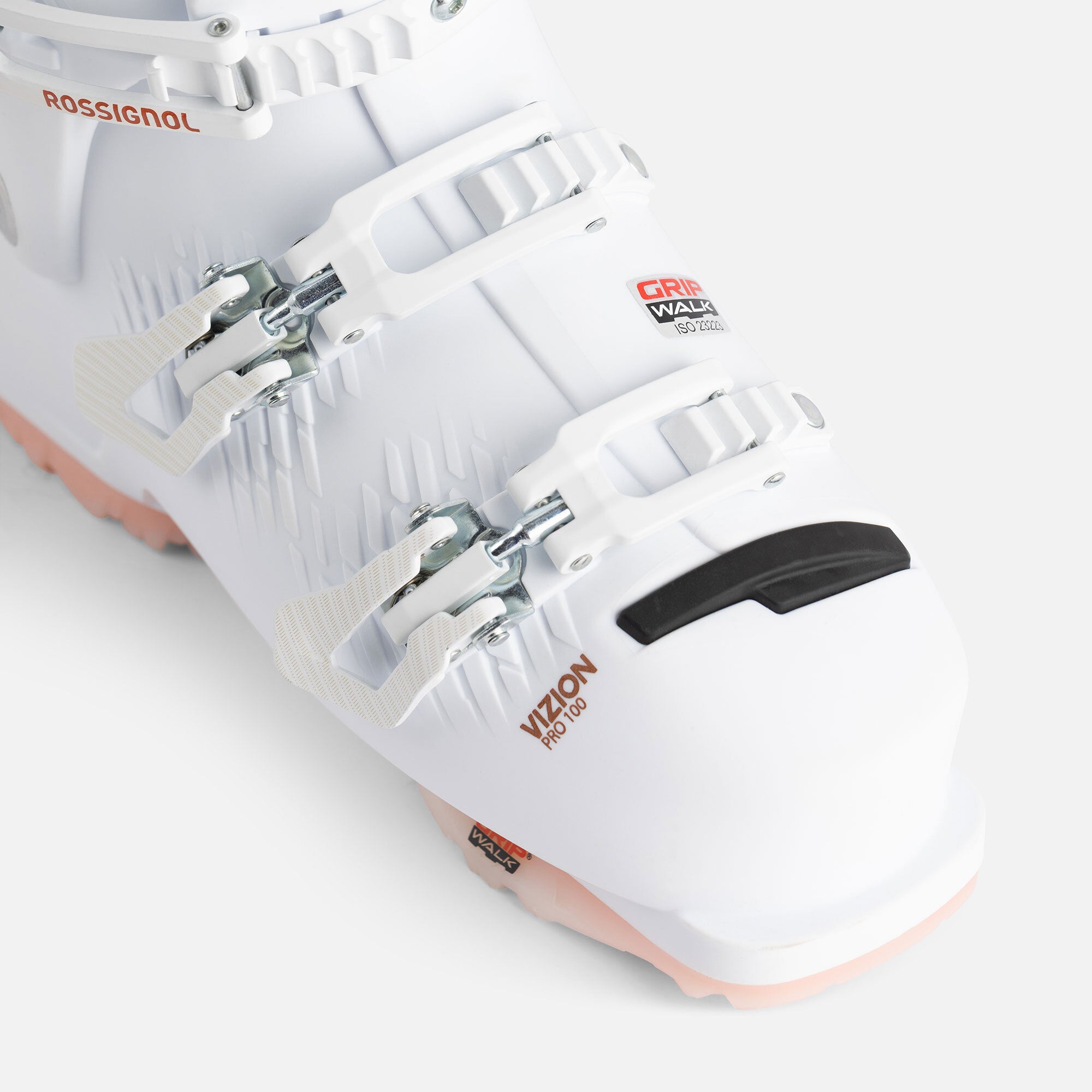 Rossignol Women's Vizion Pro 100 Ski Boots 2023 - White ski boots with silver buckles and straps.