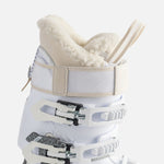 Rossignol Women's Vizion Pro 80 Ski Boot 2025 - A white ski boot with a textured, fuzzy tongue and a strap that goes over the top of the foot.