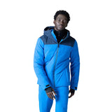 Rossignol Siz Insulated Jacket 2024 - A blue insulated jacket with a black zipper and two zippered pockets on either side.