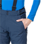 Rossignol Men's Insulated Ski Pant - A pair of navy blue ski pants with a black belt and two black buckles on the front.
