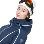 Rossignol Women's Flat Insulated Jacket 2025 - A navy blue jacket with a white stripe down the side and a zipper up the front.