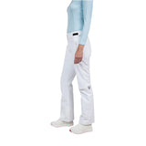 Rossignol Women's Staci Insulated Pant 2025 - A pair of white ski pants with a black logo on the left leg and a small black tag near the waistband.