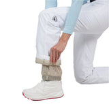 Rossignol Women's Staci Insulated Pant 2025 - A pair of white ski pants with a black logo on the left thigh and a tan stripe at the bottom hem.