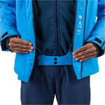 Rossignol Men's Strawpile Insulated Jacket - A bright blue jacket with a black zipper and two black buttons on the front, worn by a model in an open position.