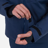 Rossignol Men's Blackside Insulated Jacket - A black insulated jacket with a zippered front and two side pockets, featuring a sleek design with a subtle sheen to the fabric.