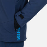 Rossignol Men's Blackside Insulated Jacket 2025 - A black insulated jacket with a zippered chest pocket and adjustable cuffs.