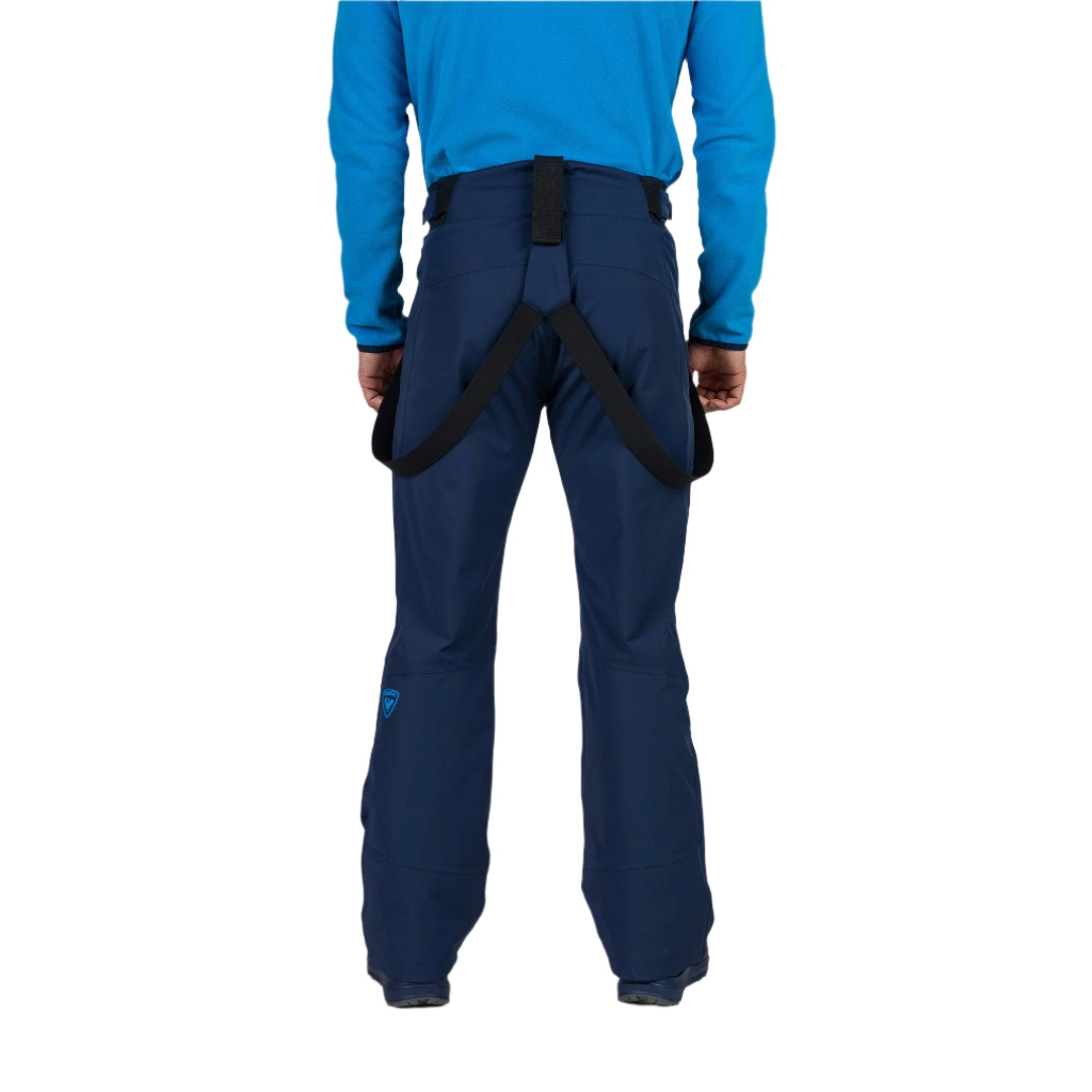Rossignol Men's Blackside Insulated Pant 2025 - A pair of black insulated ski pants with a zippered pocket on the thigh and a logo patch near the left knee.