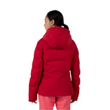 Rossignol Women's Blackside Puffy Jacket - A black puffy jacket with a hood, featuring a zippered front and two side pockets.