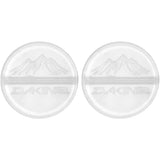 Dakine Round Scraper Stomps 2pc 2025 - Two round, clear plastic scraper stomp pads with a mountain graphic etched into them.