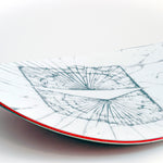 White snowboard with blue line-map graphic and red edge stripe.