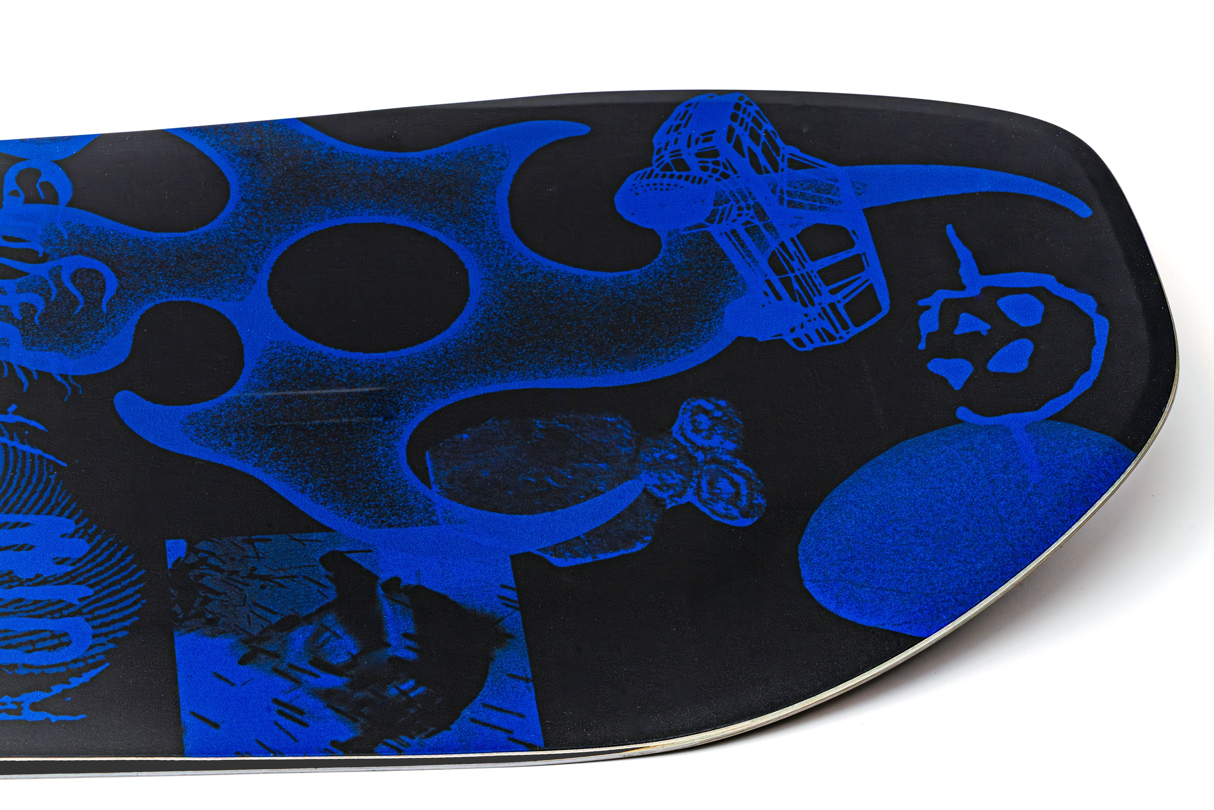 Black snowboard base with blue abstract shapes and textured pattern