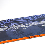 Blue snowboard with white line graphics and orange side edge