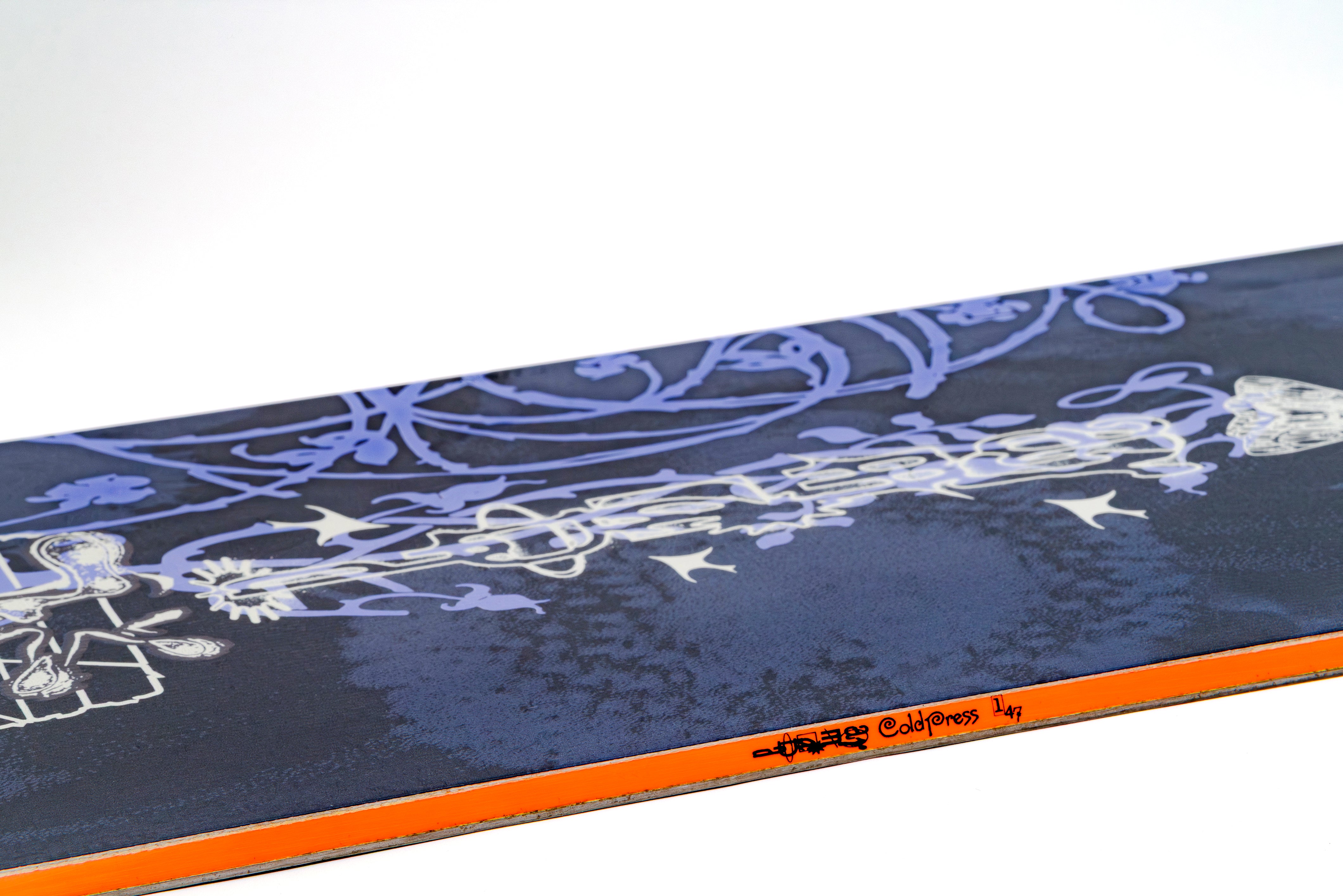 Blue snowboard with white line graphics and orange side edge