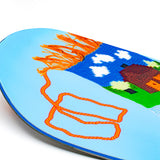 Light blue snowboard nose with large pixel-style dog graphic and orange accents