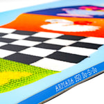 Snowboard deck with black checker stripe and bright orange graphic on light blue