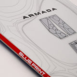 White snowboard top view with Armada text and red "BLUEPRINT" edge