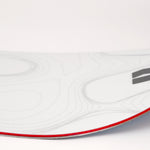 White snowboard with red edge stripe and black side logo