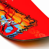 Red snowboard tip with colorful abstract artwork and orange highlights