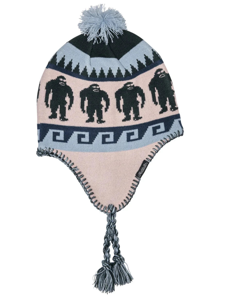 Airblaster Squatchamama Knit Beanie 2025 - A light pink beanie with a repeating pattern of dark green Bigfoot silhouettes and a gray pom-pom on top.