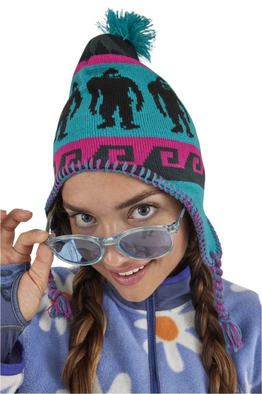 Airblaster Squatchamama Knit Beanie 2025 - A blue beanie with a pink stripe and black Bigfoot silhouettes.