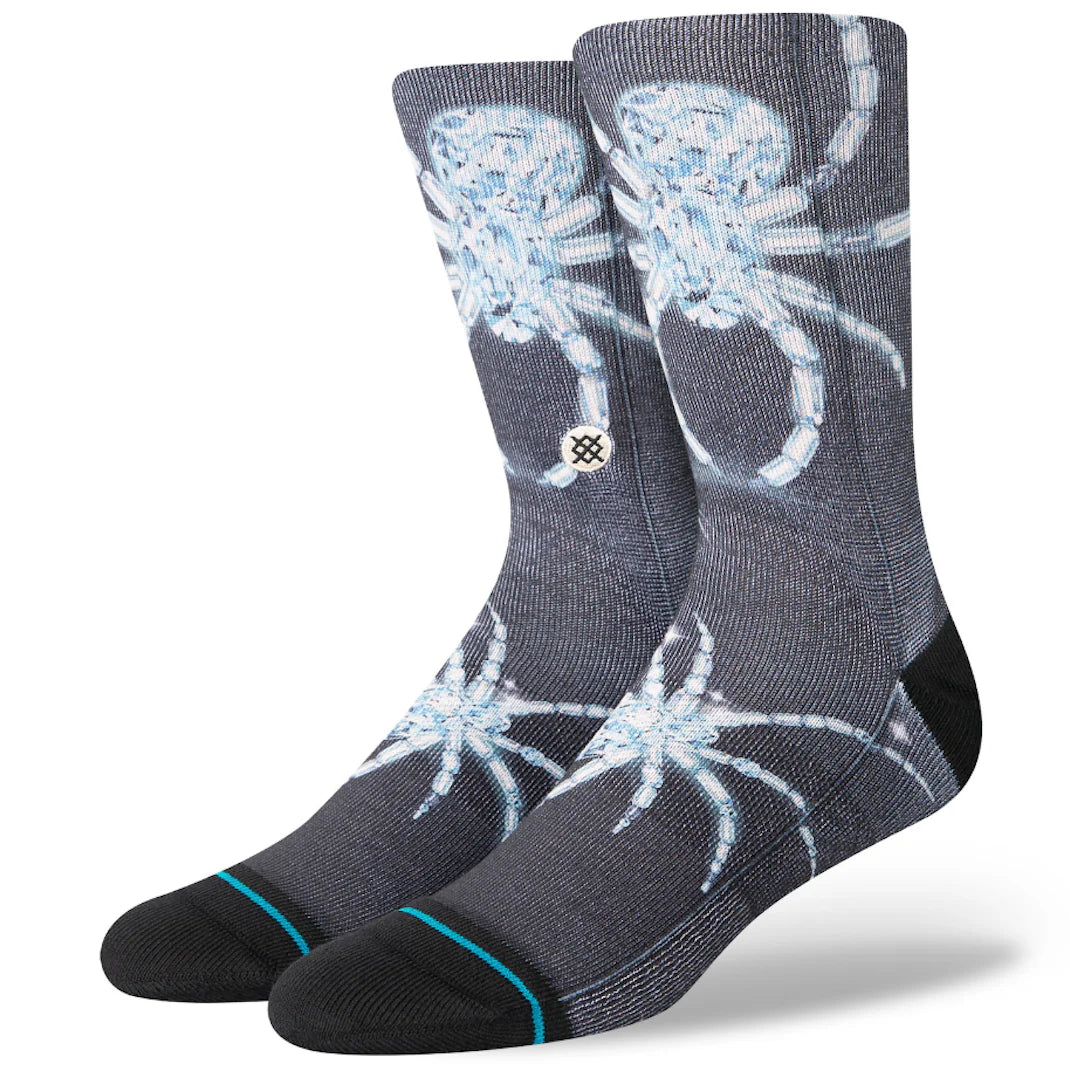 Stance X Sara Rabin Frigid Poly Crew Socks 2024 - A pair of black crew socks with a white snowboarder graphic on the top portion.