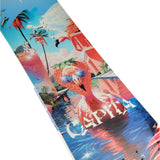 CAPiTA Women's Space Metal Fantasy Snowboard 2025 - A snowboard with a pink and blue gradient background, featuring a cartoon-style illustration of a woman in a metallic dress standing on top of a mountain.