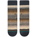 SMOKEY MOUNTAIN C SOCK 2024 - A pair of tan and gray striped socks with a small green logo on the ankle.