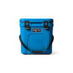 Yeti Roadie 24 Hard Cooler - A blue cooler with a handle on top and two latches on the front.