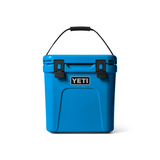 Yeti Roadie 24 Hard Cooler - A compact, portable cooler with a stainless steel handle and rubberized grip on top.