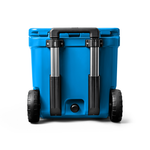 Yeti Roadie 48 Wheeled Cooler - A blue wheeled cooler with a handle on top and two wheels at the bottom.