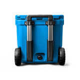 Yeti Roadie 48 Wheeled Cooler - A blue wheeled cooler with a handle on top and two wheels at the bottom.