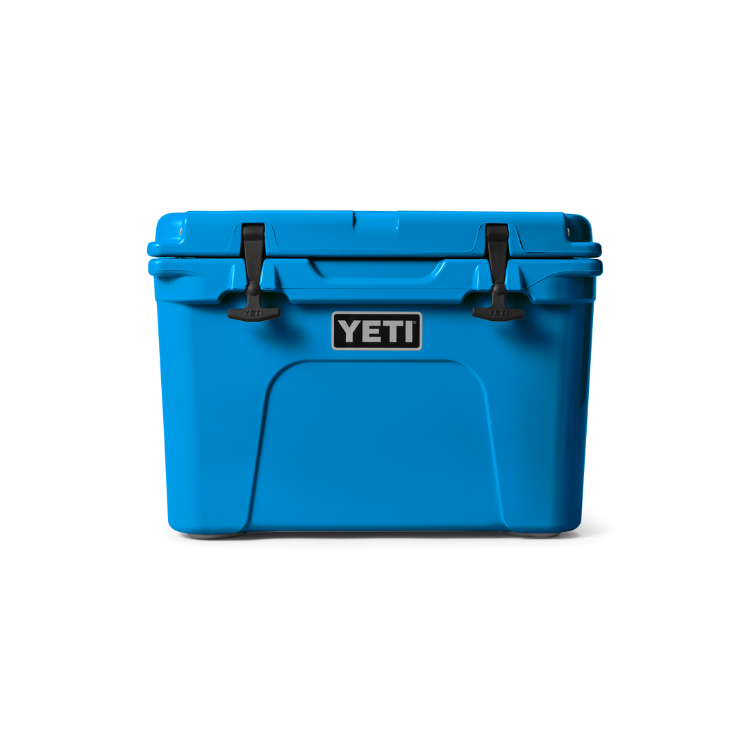 Yeti Tundra 35 Hard Cooler - A large, rectangular cooler with a dark gray lid and matching body, featuring a handle on top and a logo in silver lettering.