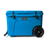 Yeti Tundra Haul Wheeled Cooler - Large, blue cooler with black wheels and handle on a white background.