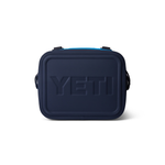 Yeti Hopper Flip 12 Personal Cooler - A navy blue cooler with a handle on top and a zipper closure.